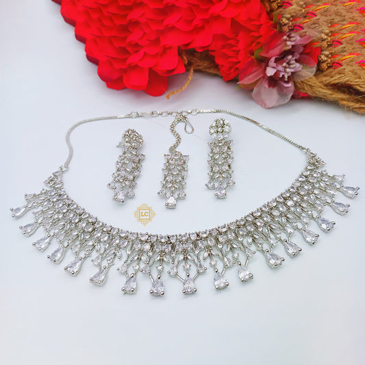 American Diamond Silver Jewellery Set With Earrings and Maangtikka.
