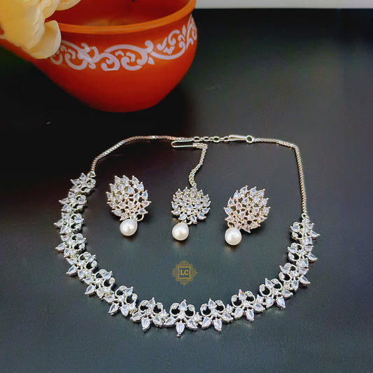 American Diamond Silver Jewellery Set With Earrings and Maangtikka.