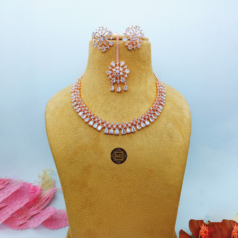 American Diamond Rose Gold Jewellery Set With Earrings and Maangtikka.