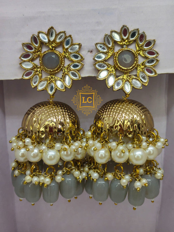 Sparkling Kundan Gold Plating Jhumka Earrings.