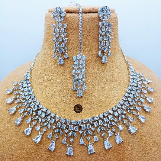 American Diamond Silver Jewellery Set With Earrings and Maangtikka.