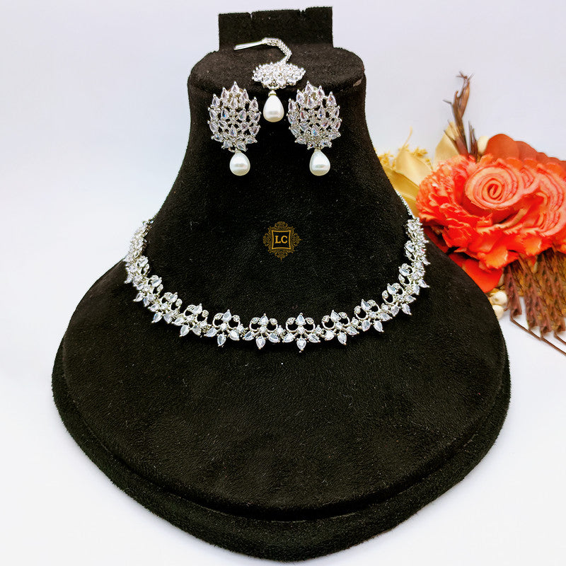 American Diamond Silver Jewellery Set With Earrings and Maangtikka.