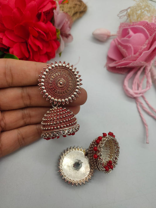 Oxidized Silver Jhumka Earrings with Red Beads
