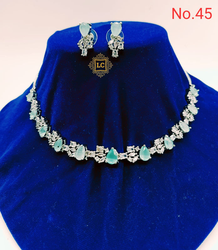 American Diamond Silver Jewellery Set With Earrings and Maangtikka.