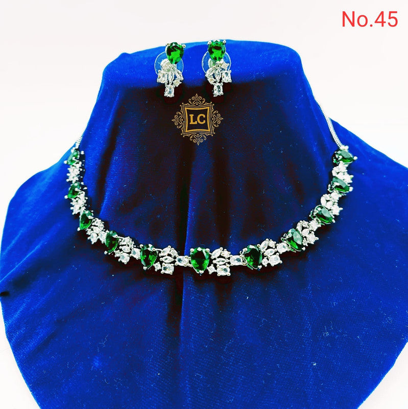 American Diamond Silver Jewellery Set With Earrings and Maangtikka.